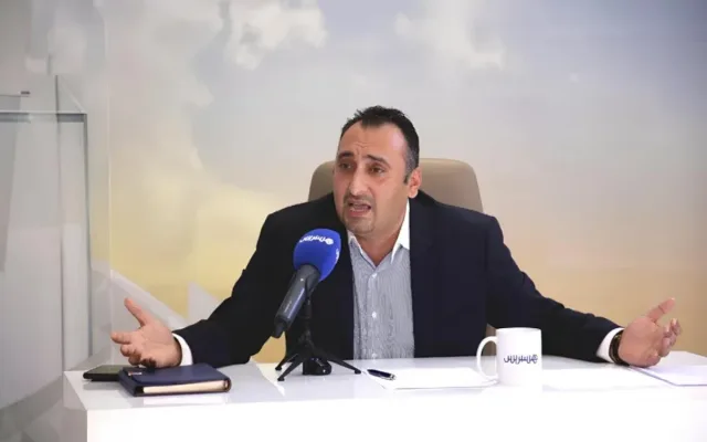 Isaac Charia lors d’une prise de parole